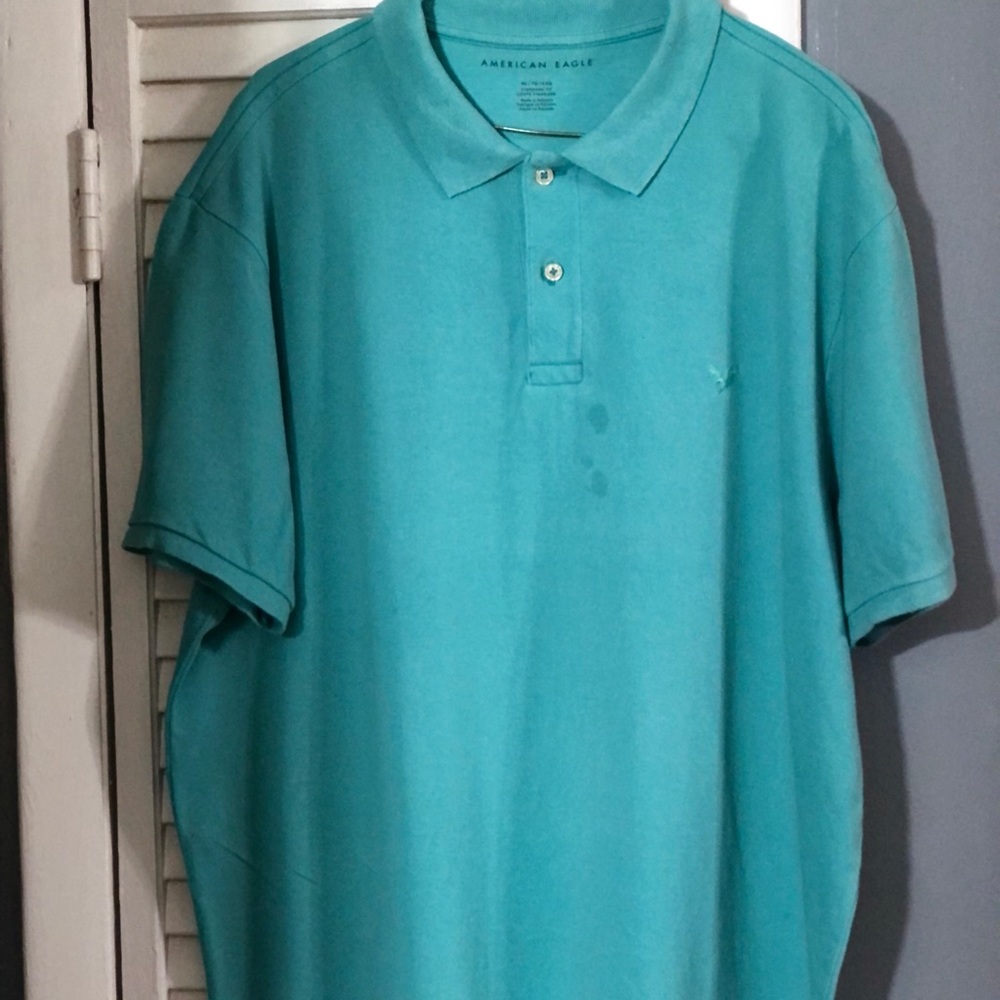 American Eagle Outfitters Turquoise Cotton Polo Sz XL. Small stain on the front.